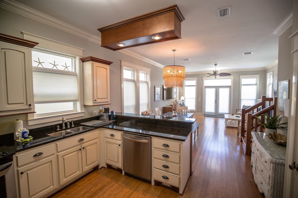 Your gourmet kitchen features granite countertops and premium appliances, flowing into an elegant living space where you'll love cooking and entertaining.