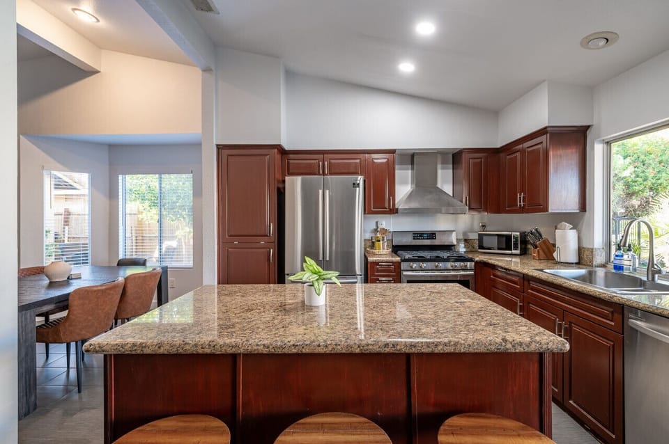 Kitchen With Island and Barstool
