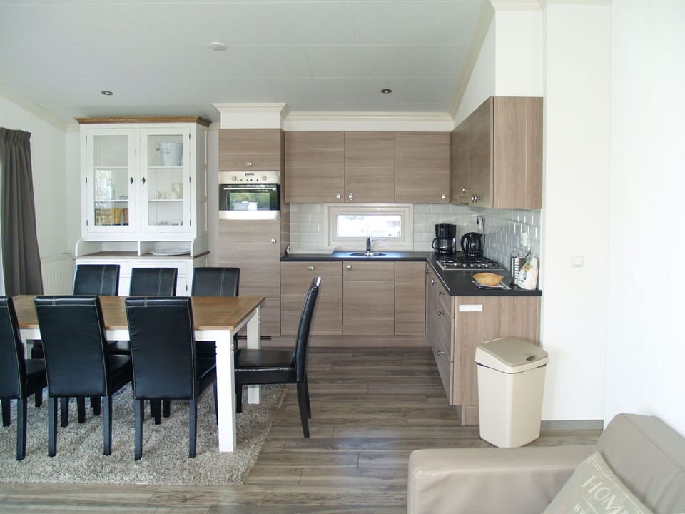 Cabinetry, Furniture, Countertop, Building, Chair, Wood, Kitchen, Kitchen Appliance, Floor, Flooring