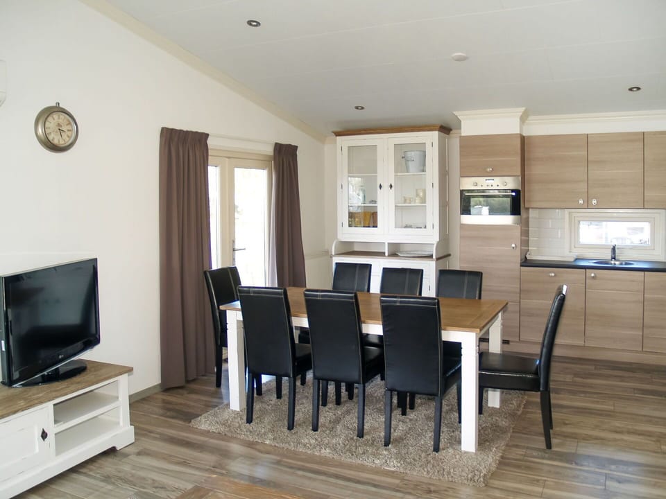 Furniture, Table, Couch, Chair, Wood, Television, Living Room, Cabinetry, Picture Frame, Shade