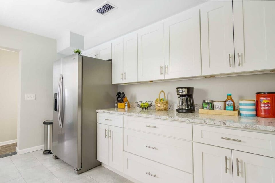 Fully equipped kitchen with ample storage, modern appliances, and everything you need to feel at home.