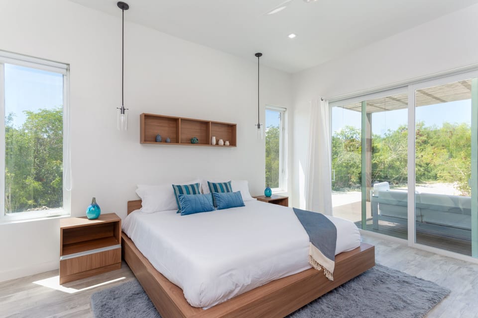 Bedroom 1- Tastefully decorated, with  smart TV and private deck