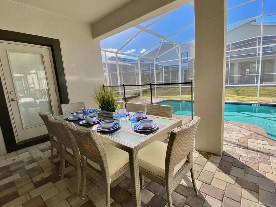 Outdoor patio- door to the bathroom with shower