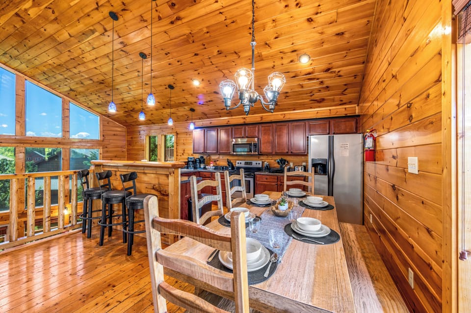Dining with a View – A stylish dining area with warm lighting