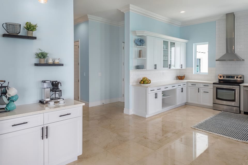 Main level fully equipped gourmet kitchen area with view of the coffee bar area