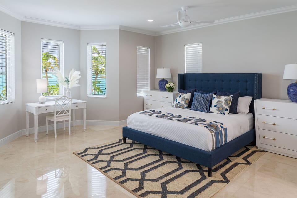 Lower-level spacious Junior Master Suite with stunning water views