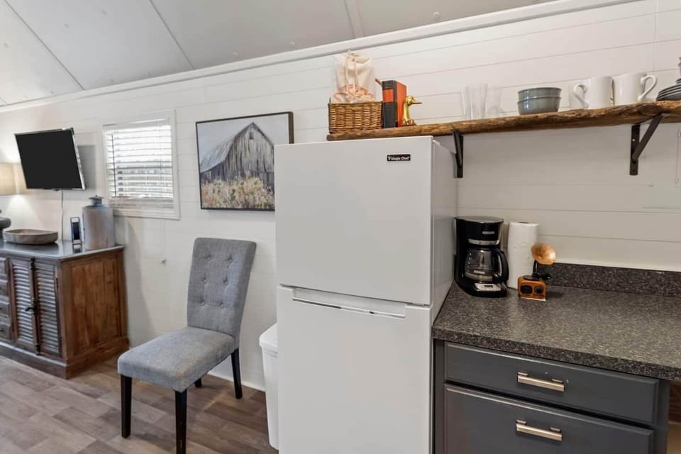 Full-sized refrigerator/freezer. Drip coffee maker