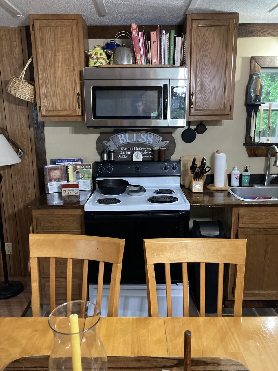 Kitchen comes with modern appliances, unlike former logging camp lodging.