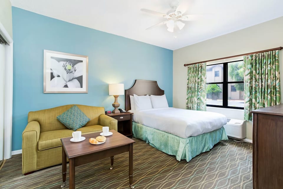 Stretch out on a studio with full bed, a private bathroom and a sitting area