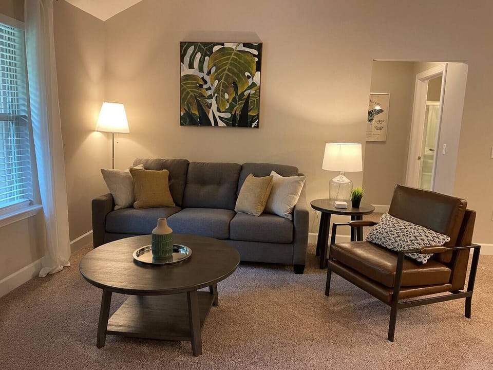 Comfortable furniture in the spacious open-concept living area.