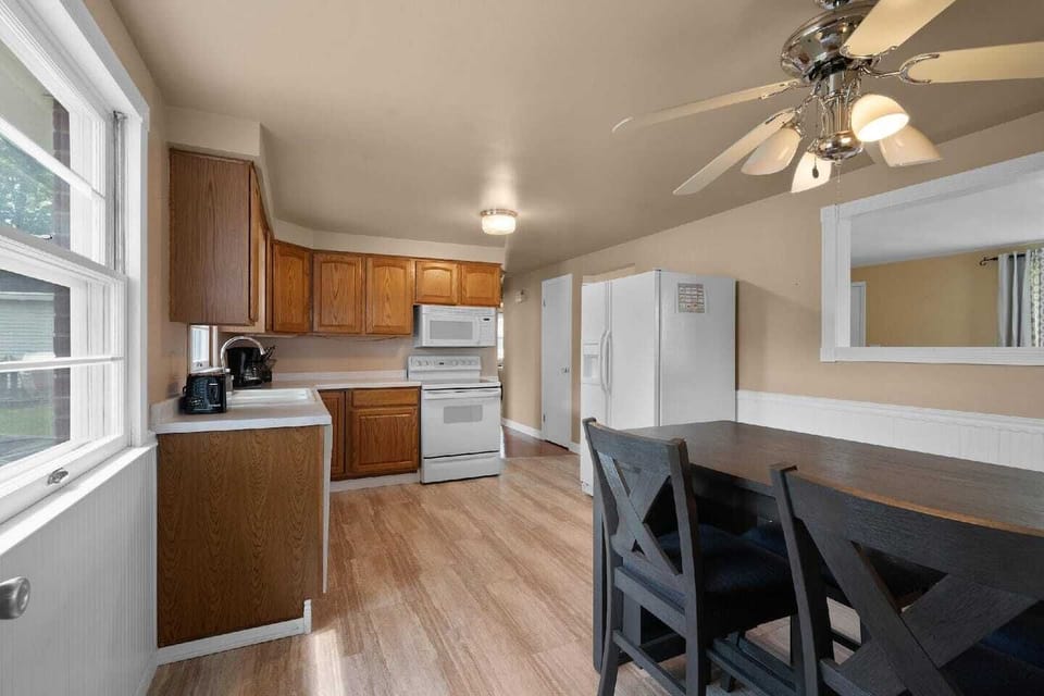 Fully stocked kitchen with dining table