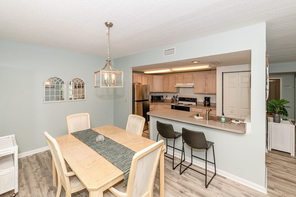 Dining Room with Kitchen Pass Through Bar