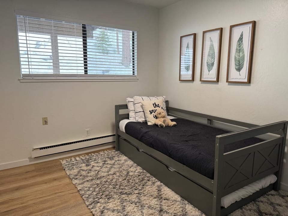The third bedroom has a single bed with a pull-out trundle.