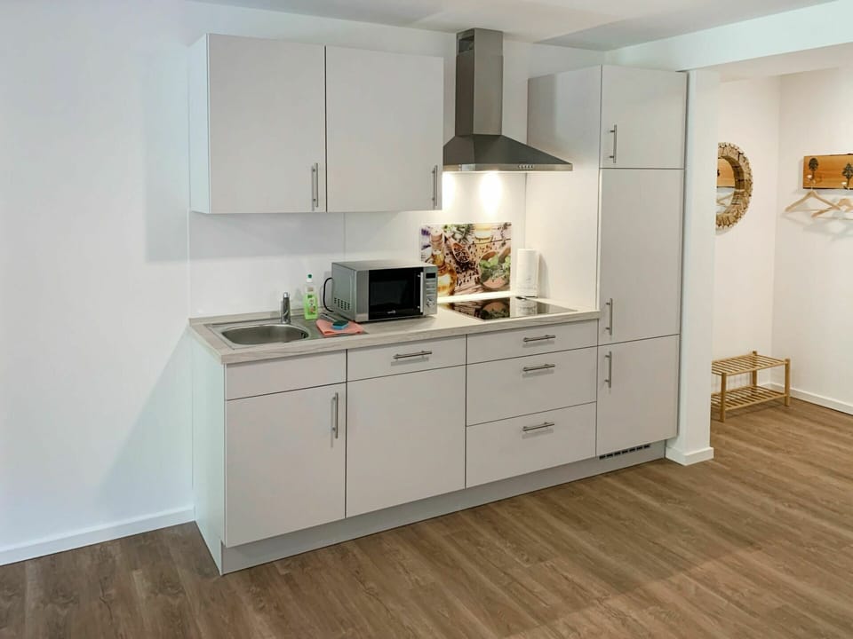 Cabinetry, Furniture, Countertop, Drawer, Wood, Building, Floor, Flooring, Kitchen