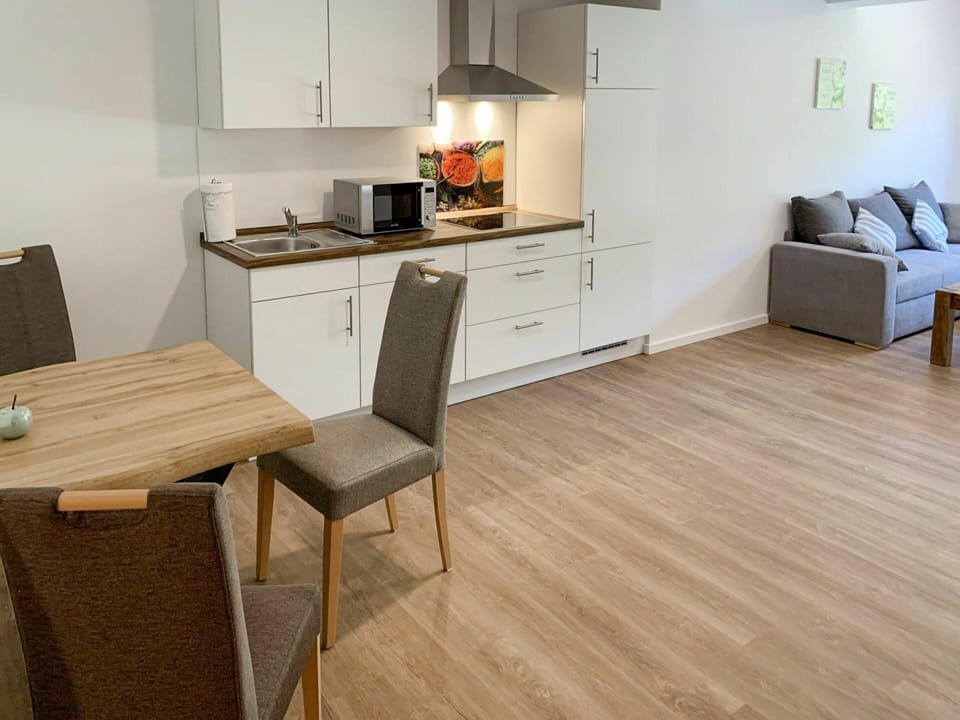 Cabinetry, Property, Furniture, Countertop, Couch, Kitchen, Table, Kitchen Appliance, Building, Wood
