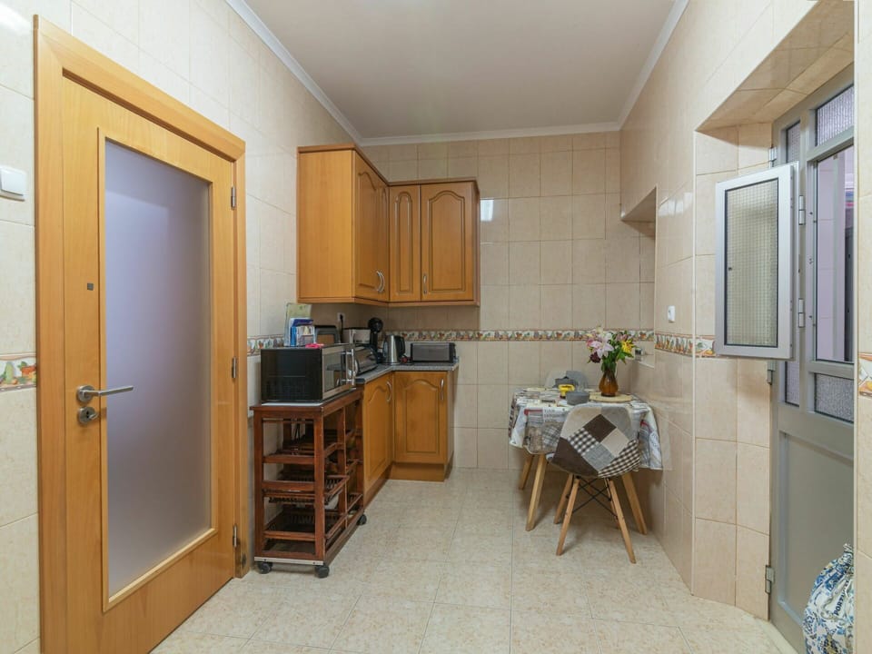 Cabinetry, Furniture, Countertop, Building, Wood, Chair, Table, Kitchen, Interior Design, Home Appliance