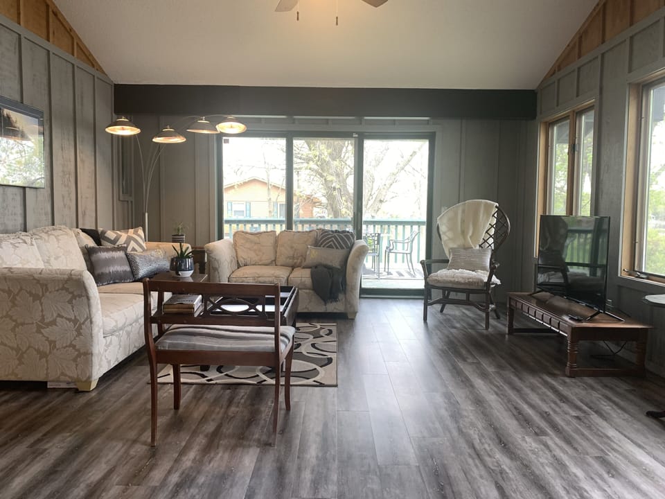 Sunroom walks out to the deck.
