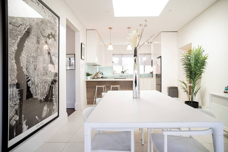 Open-plan kitchen and dining area with plenty of natural light.