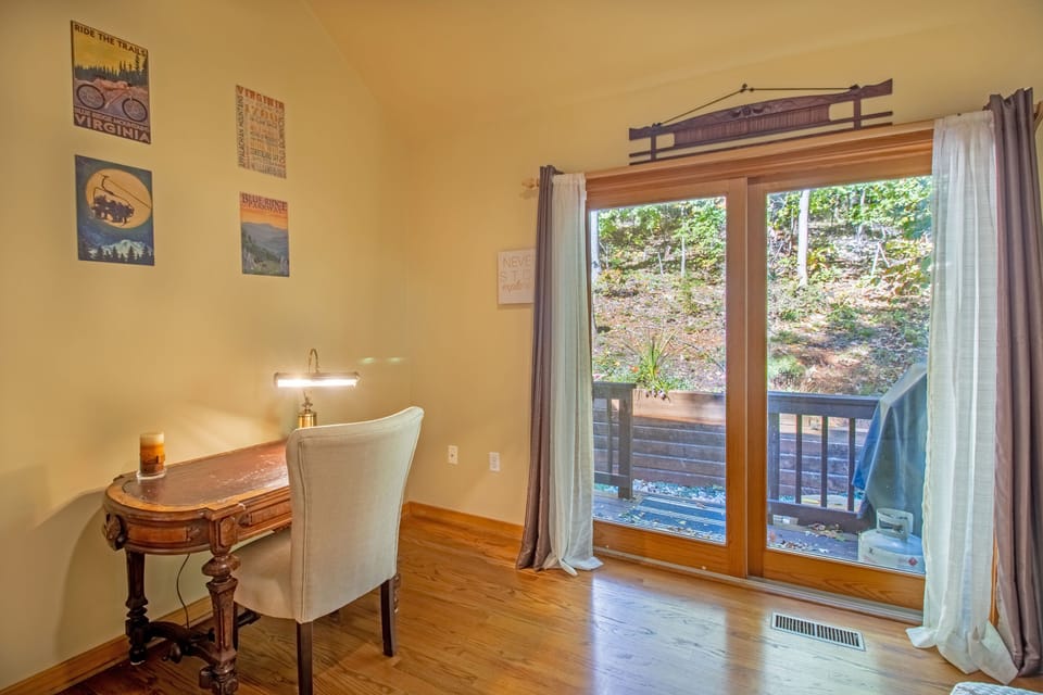 Office space with queen sleeper sofa and access to back deck with gas grill