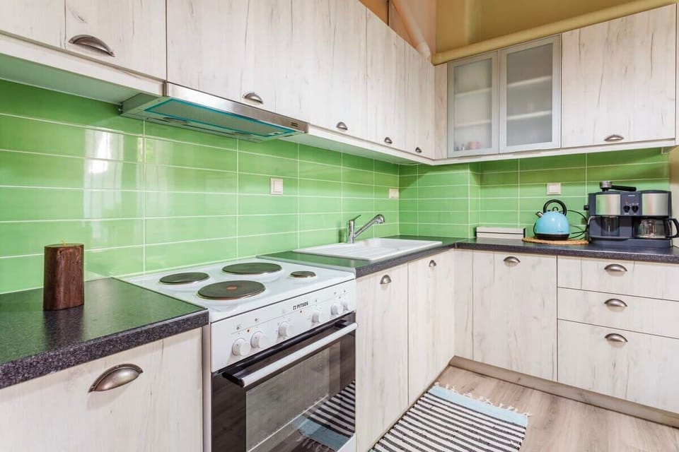 The kitchen has all the necessary amenities for your stay