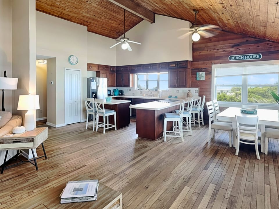 Living Room Connecting to the Kitchen + Dining Area