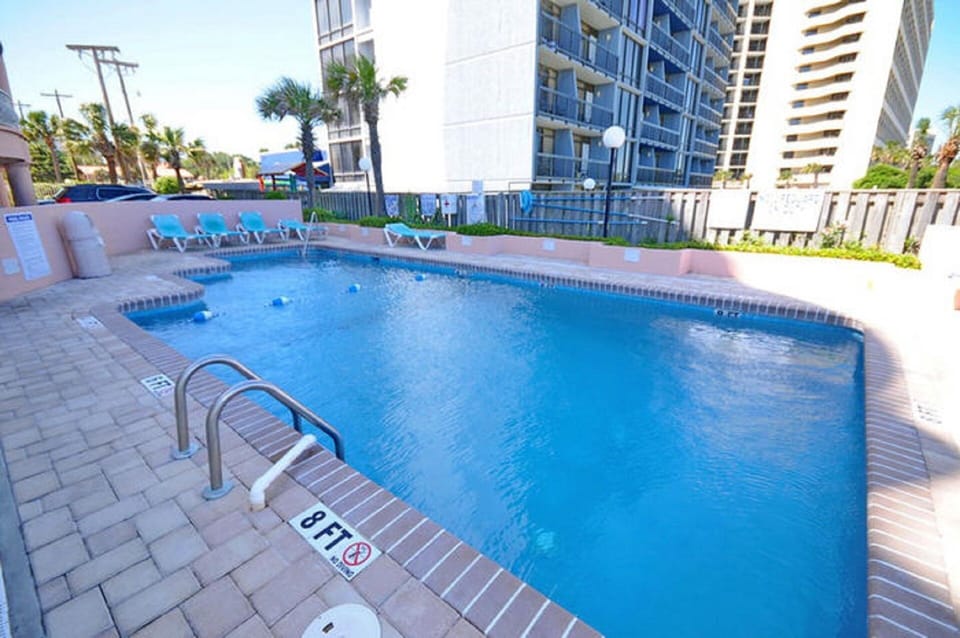 Take a cool dip in the pool after a fun day at the beach.