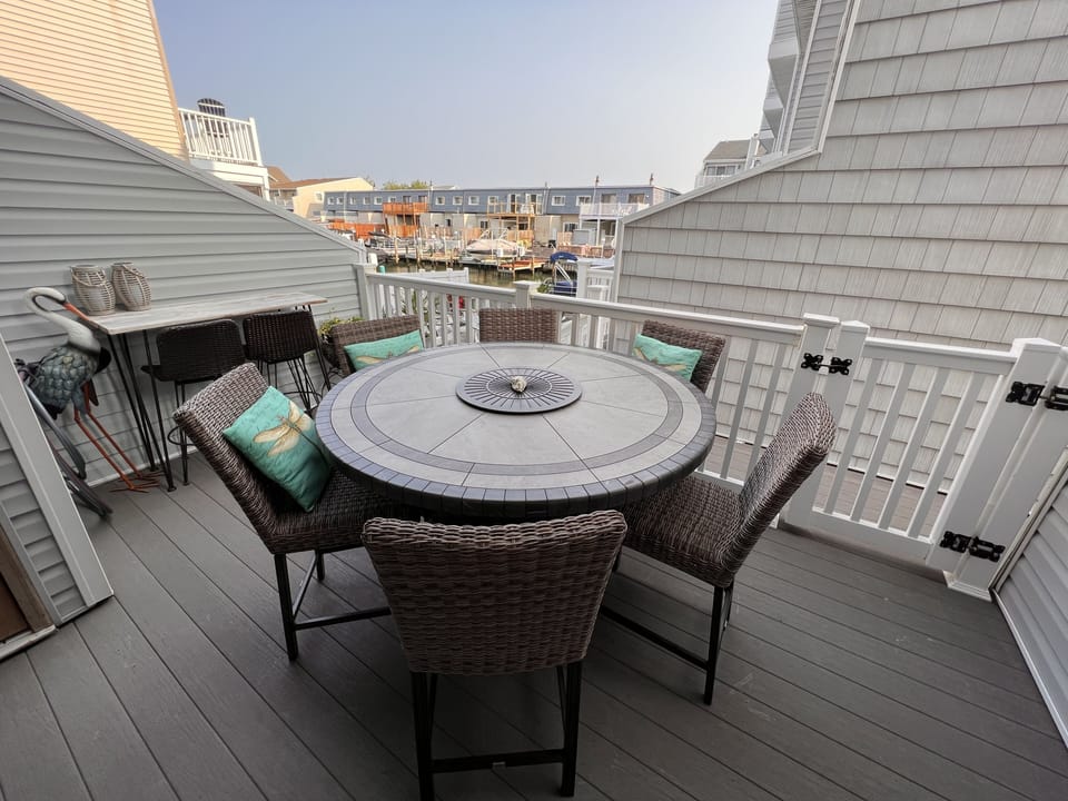 1st floor deck with seating for 8 people