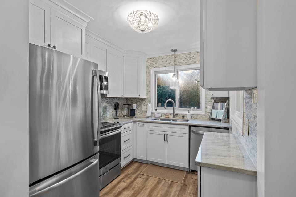 Kitchen offers stainless appliances with dishwasher!