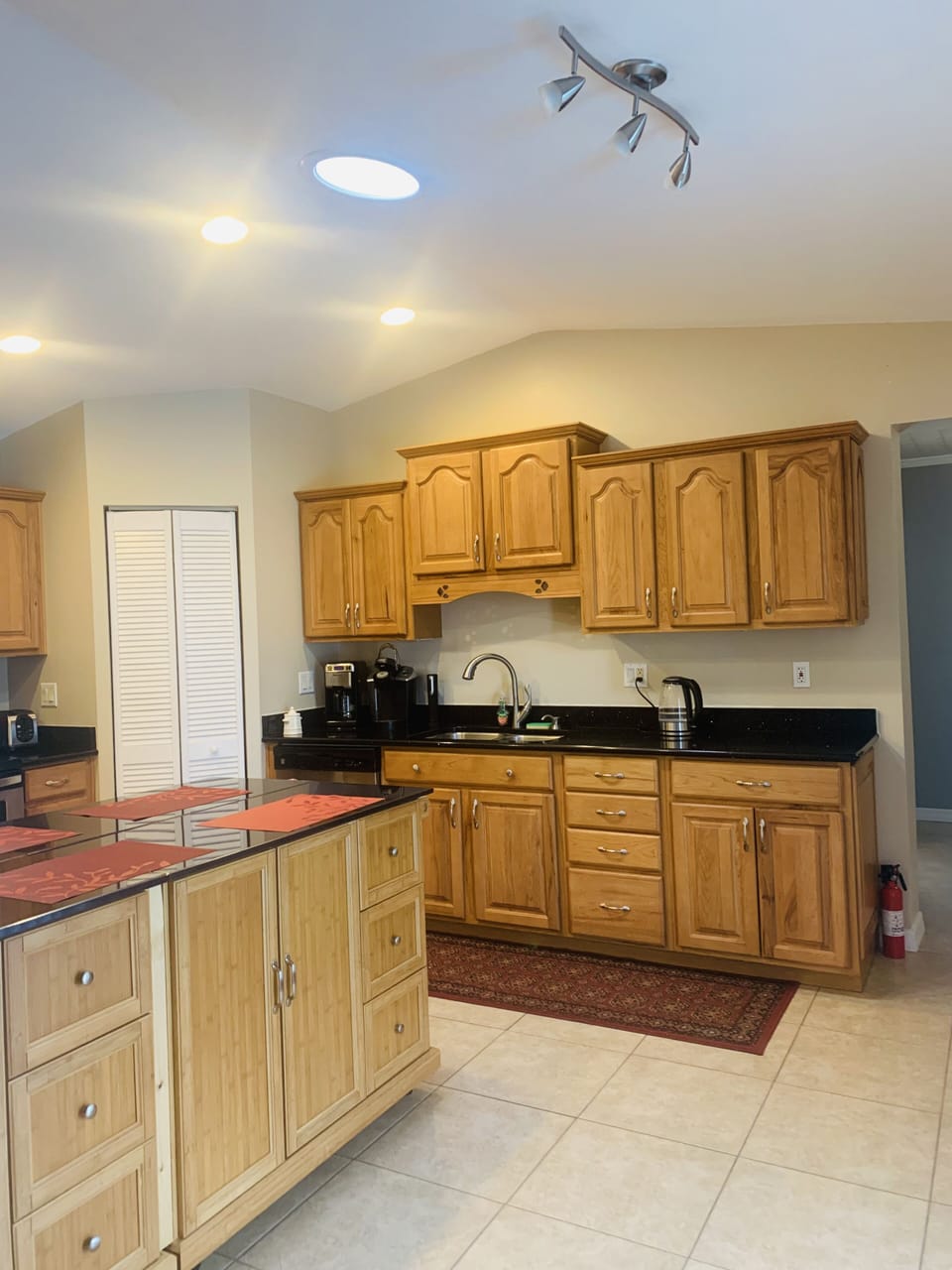 Kitchen with coffee maker.