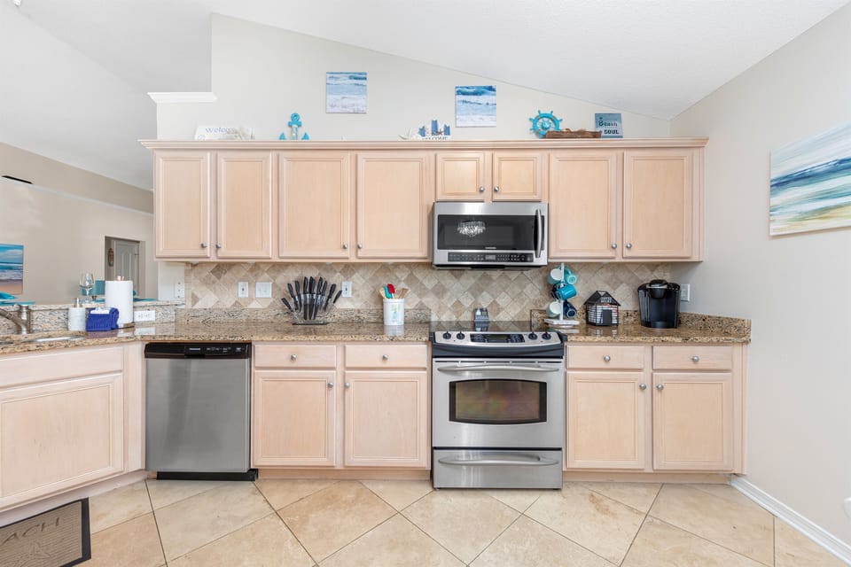 Unleash your culinary skills in our generously equipped, spacious kitchen for preparing delicious meals to savor and enjoy.