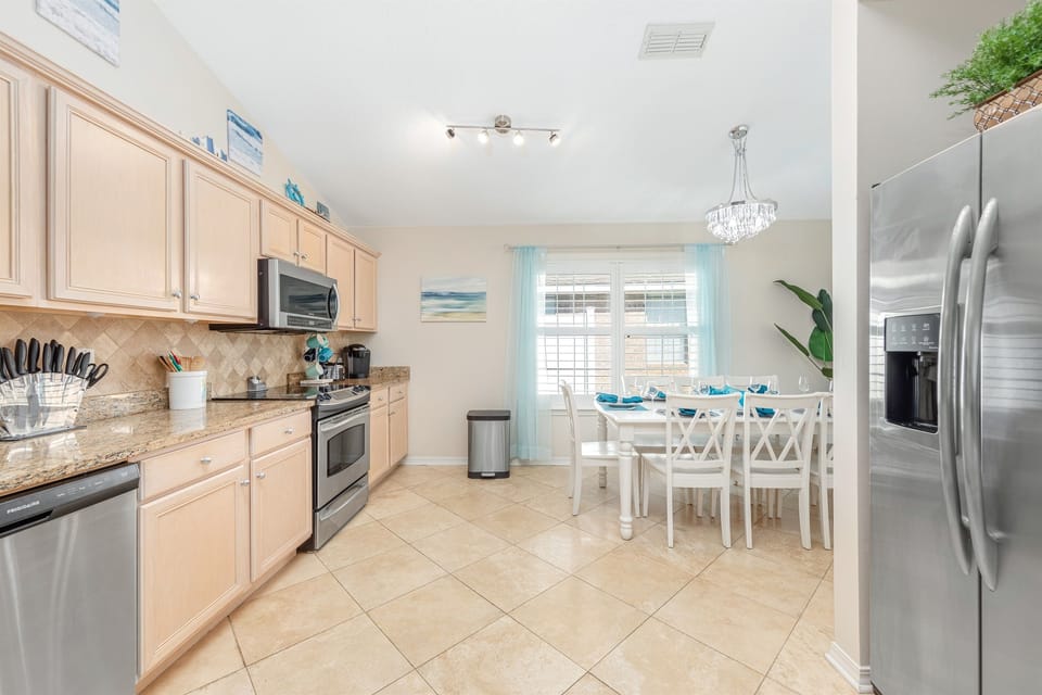 Create unforgettable moments with the comforts of home in our fully equipped kitchen and expansive dining area, perfect for crafting memorable meals together.