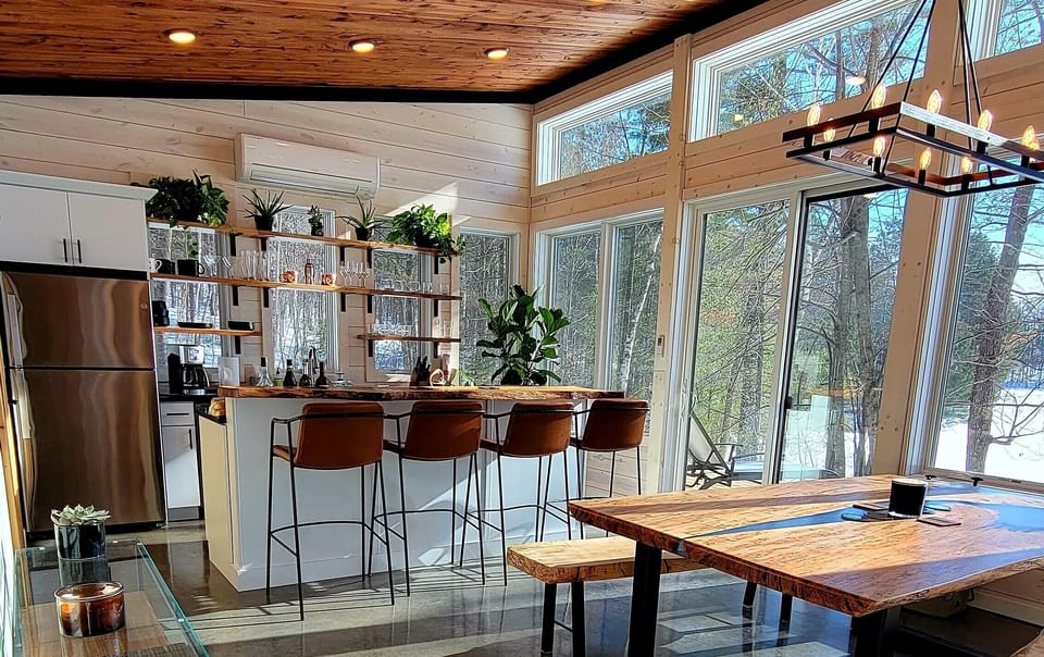 The kitchen is open, airy, and fully equiped for cooking.