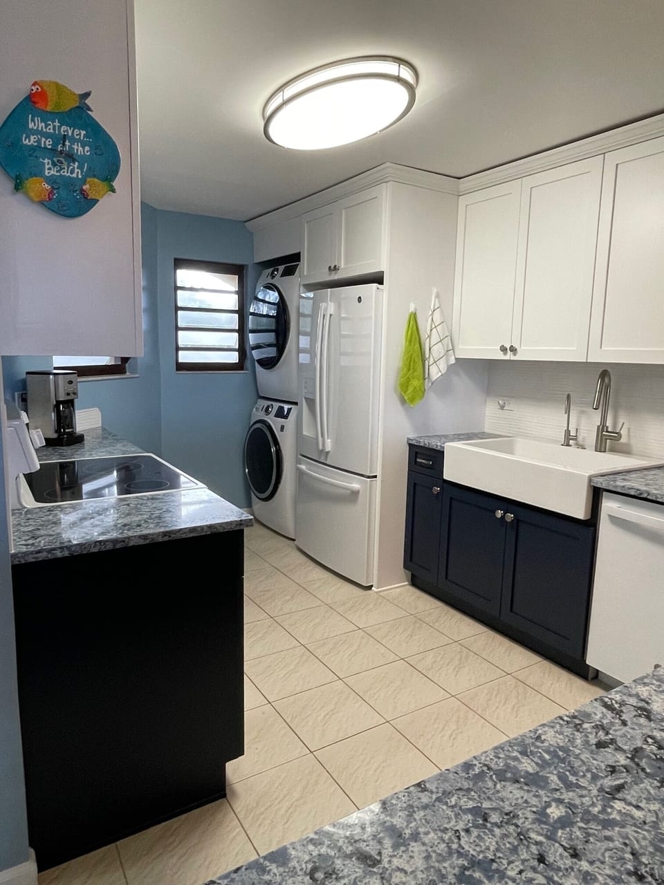 The newly remodeled kitchen has everything you need to prepare meals and drinks.