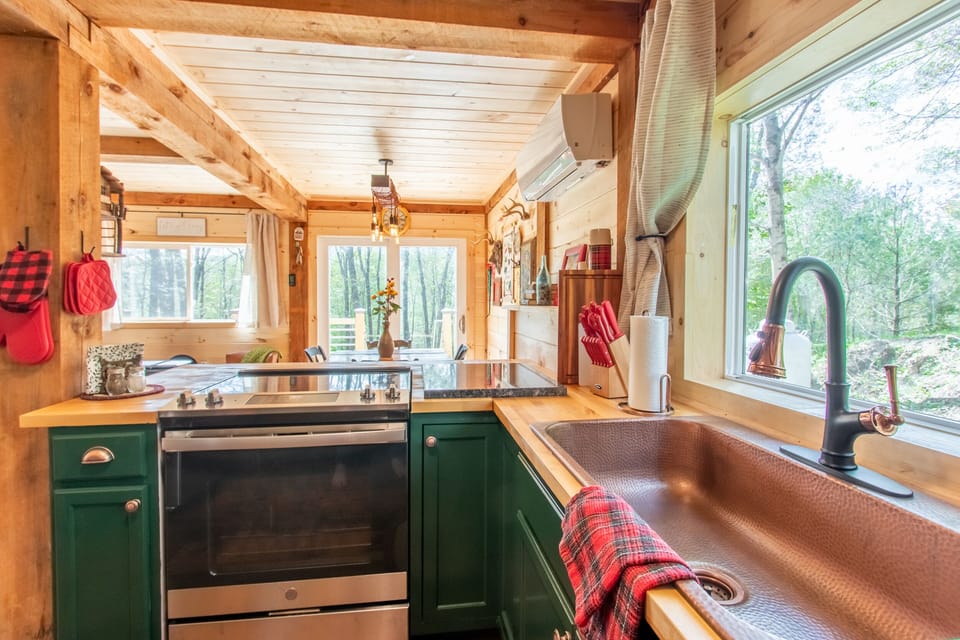 Full kitchen with copper sink