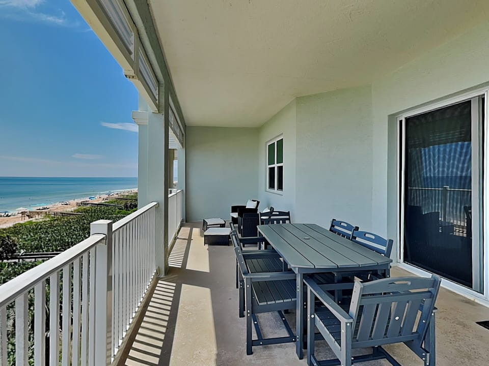 Covered Balcony Dining + Ocean Views