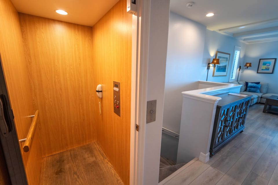 Elevator and stairs at the third-story. 