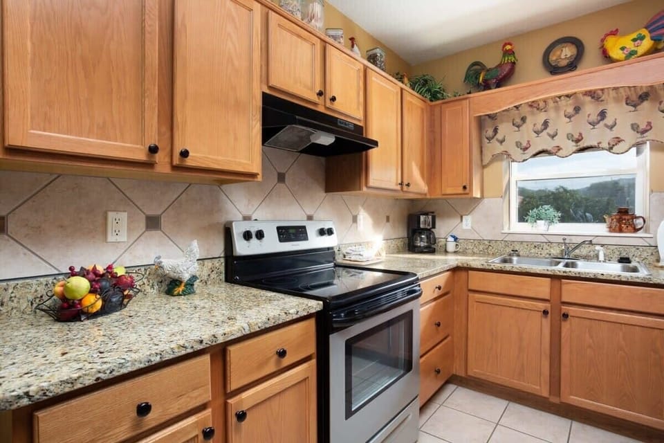 Kitchen Complete With Granite Countertops And Stainless Steel Appliances!