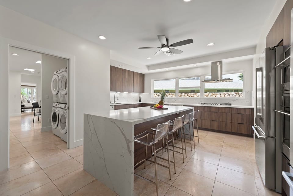 Modern kitchen island with bar seating—perfect for casual breakfasts or evening wine.