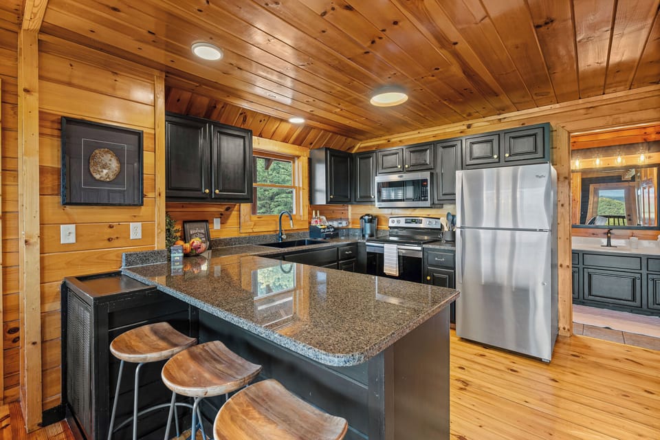 Fully equipped kitchen with stainless appliances