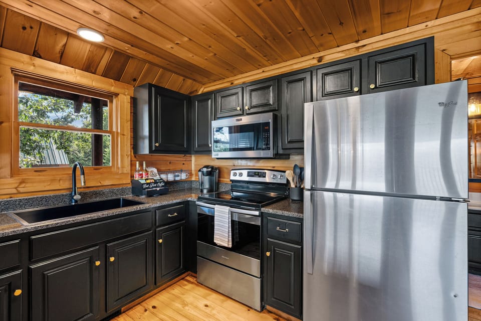 Fully equipped kitchen with stainless appliances