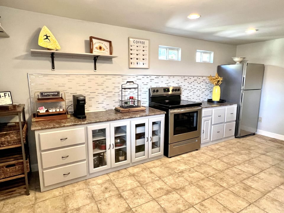 Keurig coffee maker, Silverware, plates, cups, pans, and more.
