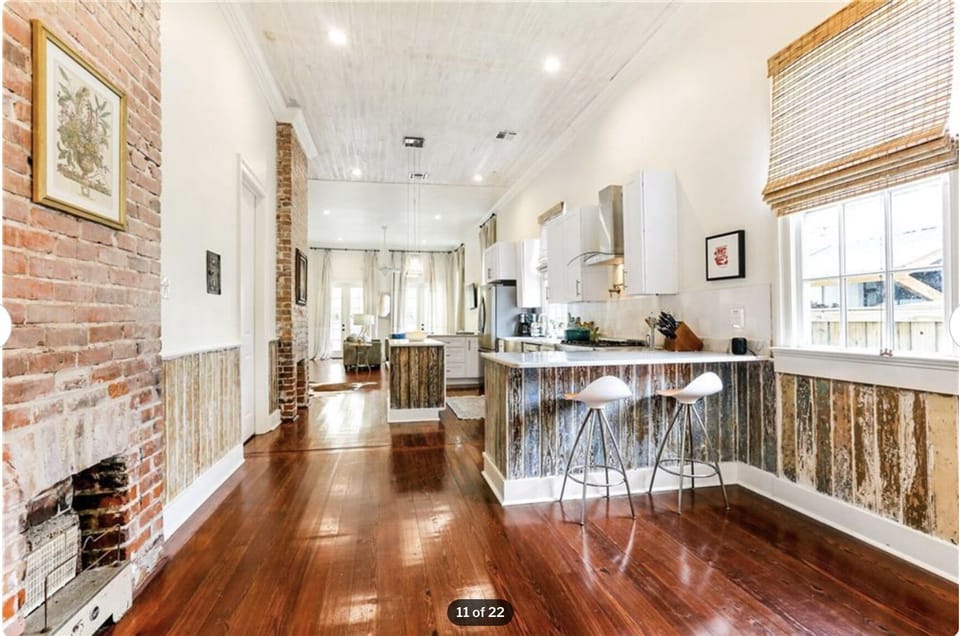 Kitchen with two breakfast bars.  One on each side.  