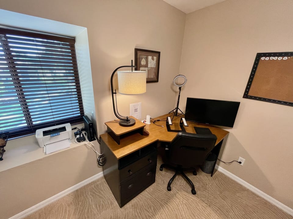 Desk, HP Laser Printer and Samsung 27" 4K monitor on arm.