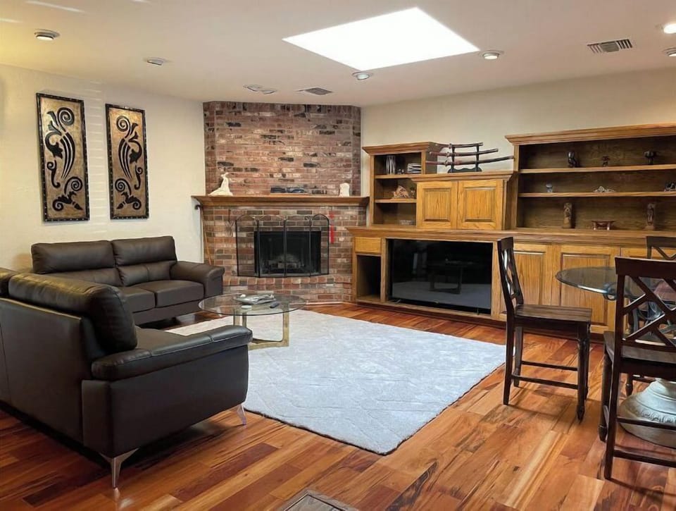 Great room living area with fireplace.