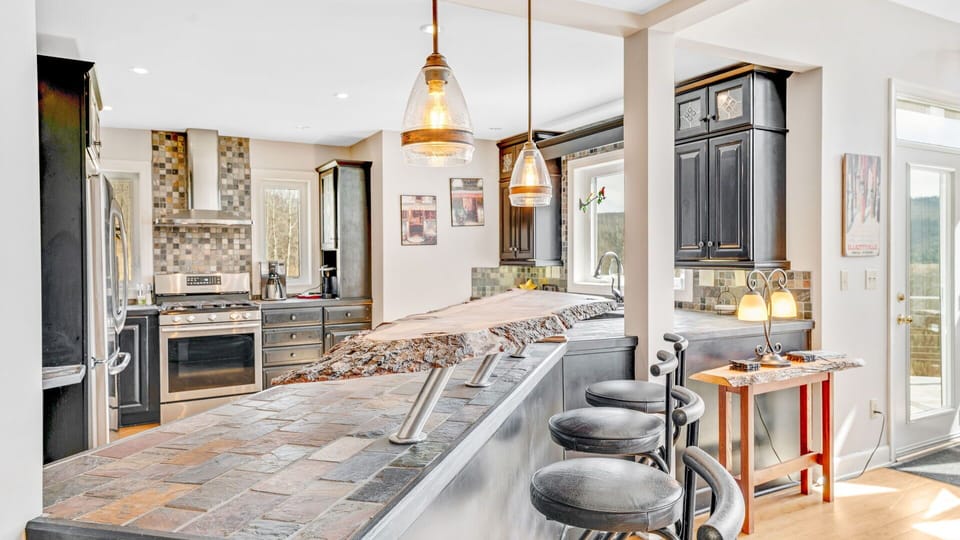 Natural wood bar with four handmade wooden bar stools (not pictured here)