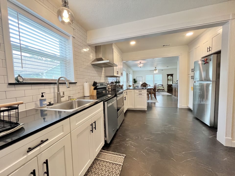 Open living/dining/kitchen area. Lots of natural light!