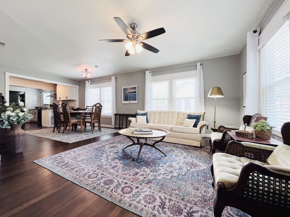 Living room with Roku TV and dedicated workspace