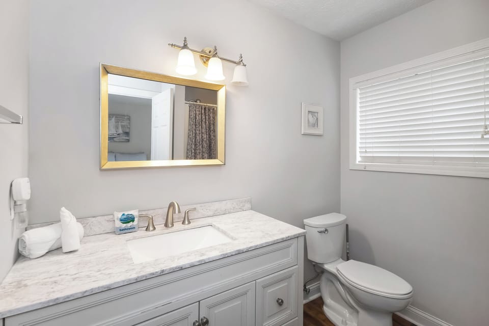 Ensuite bathroom in the lower level primary suite