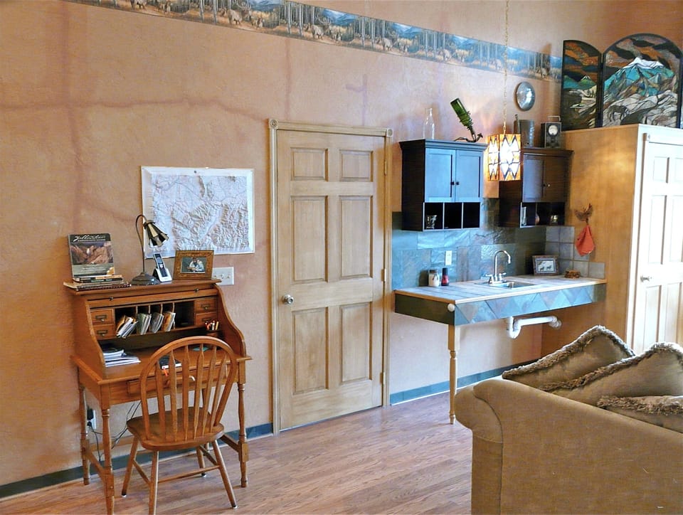 The desk has an information guide. There is a wet bar for your happy hour!