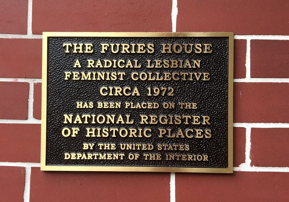 Plaque installed next to entrance to house